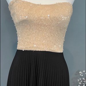 Beige sequin strapless dress with a black high low pleated bottom!